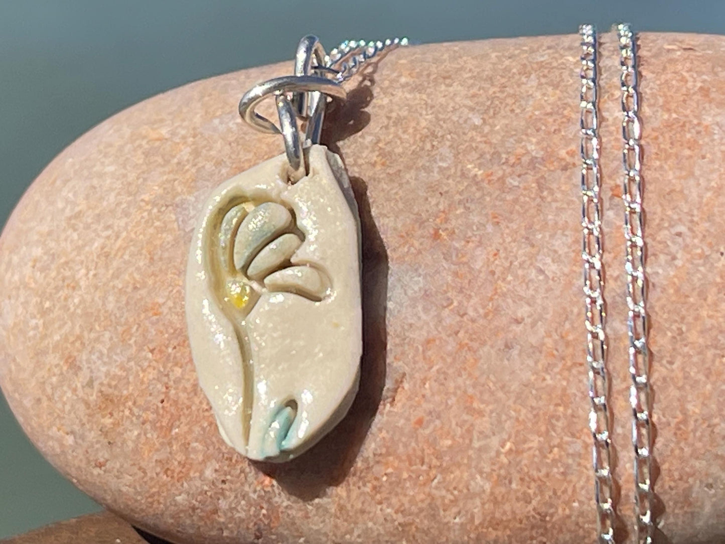 Handmade porcelain daisy pendant. Eco friendly jewellery. Handmade daisy necklaces on recycled sterling silver. Ethical jewellery. Eco gifts.