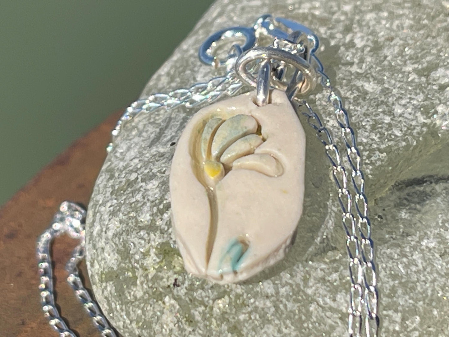 Handmade porcelain daisy pendant. Eco friendly jewellery. Handmade daisy necklaces on recycled sterling silver. Ethical jewellery. Eco gifts.