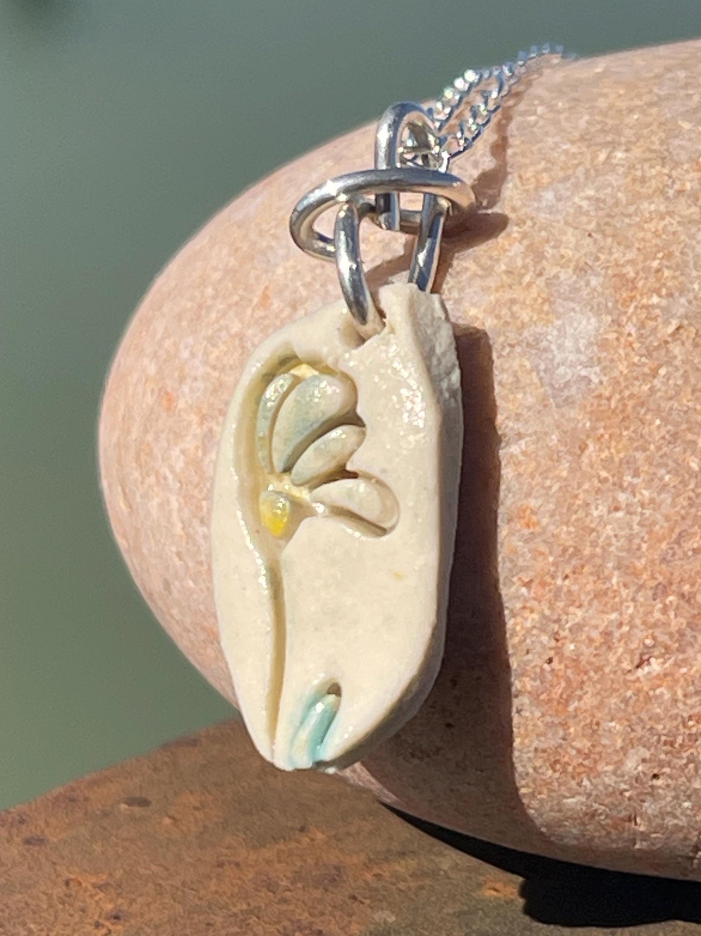 Handmade porcelain daisy pendant. Eco friendly jewellery. Handmade daisy necklaces on recycled sterling silver. Ethical jewellery. Eco gifts.