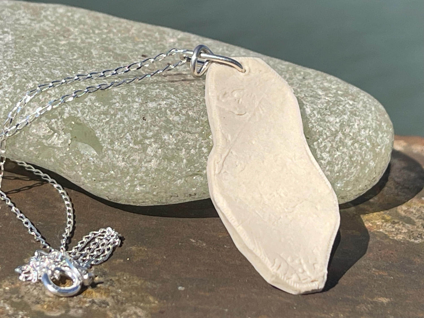 Handmade morning glory necklace. Eco friendly jewellery. Ethical pendants made with waste clay and recycled silver. Ethical jewellery.