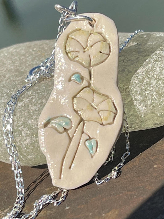 Handmade morning glory necklace. Eco friendly jewellery. Ethical pendants made with waste clay and recycled silver. Ethical jewellery.