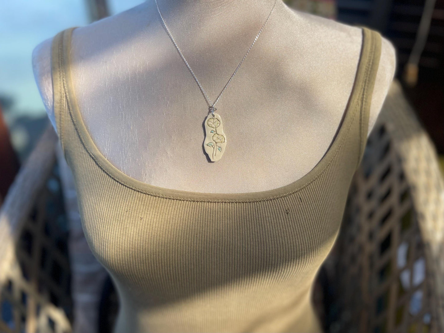 Handmade morning glory necklace. Eco friendly jewellery. Ethical pendants made with waste clay and recycled silver. Ethical jewellery.