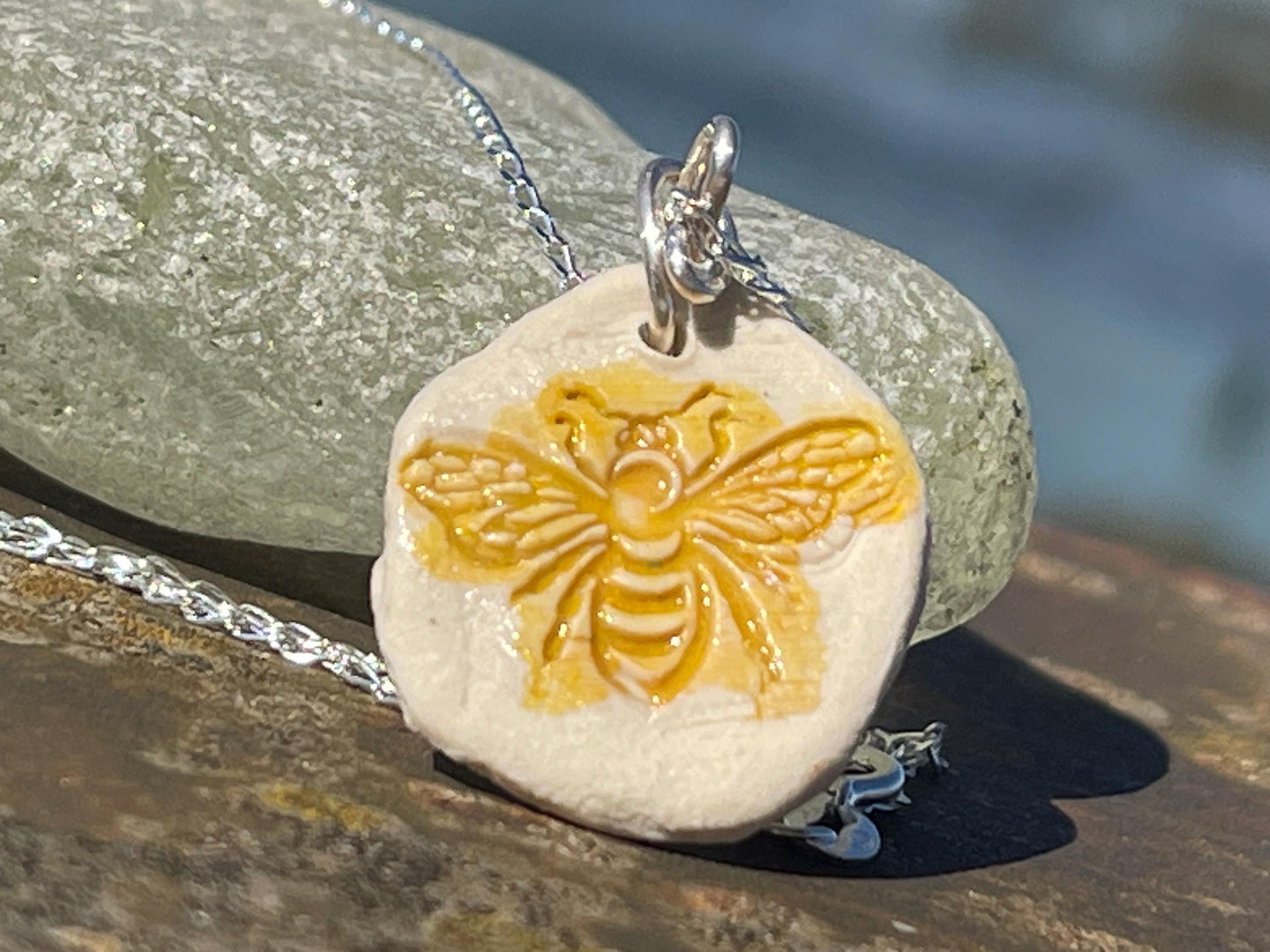 Handmade bee necklace. Eco friendly jewellery. Ethical pendants made with waste clay and recycled sterling silver. Ethical jewellery.
