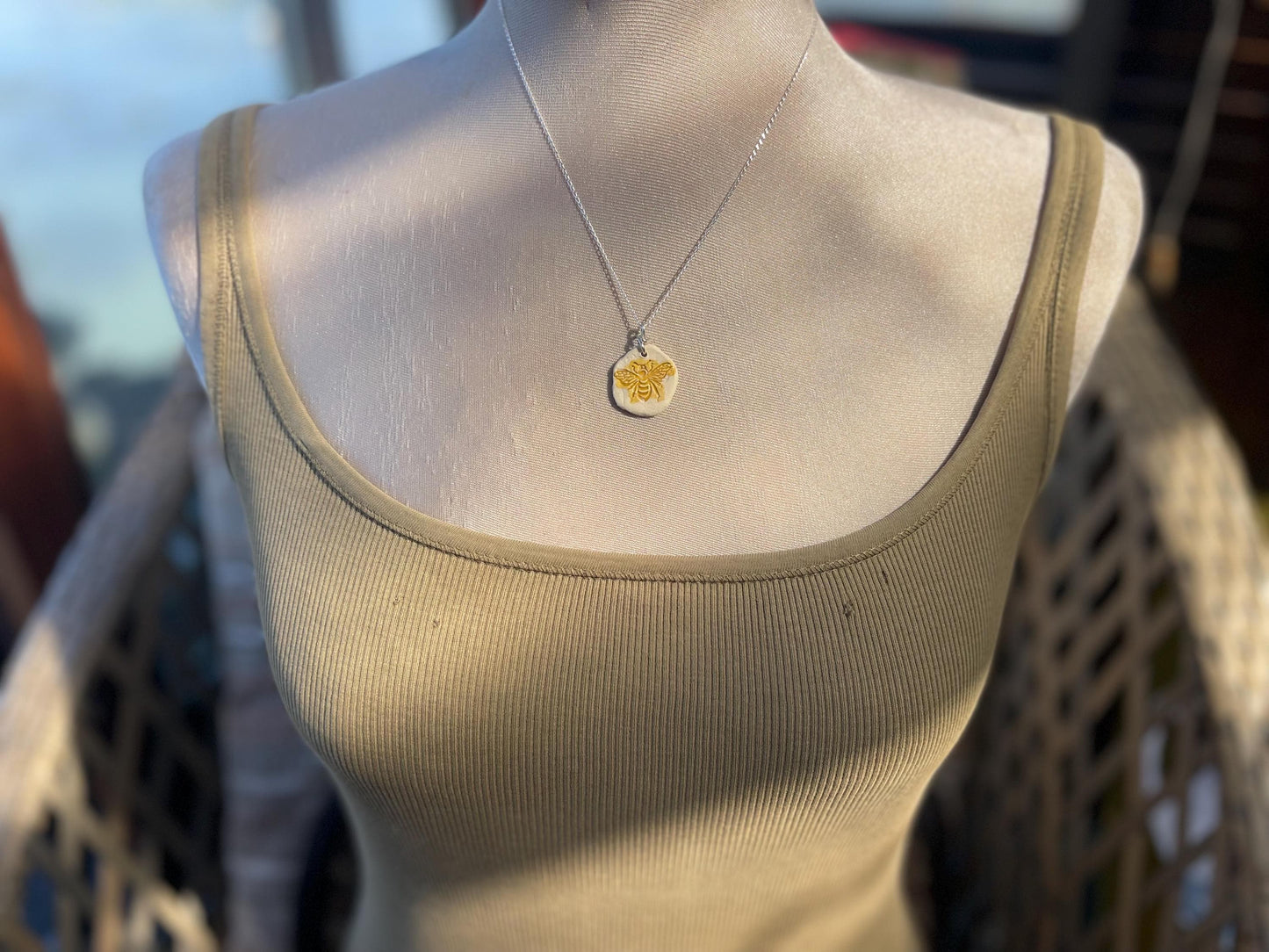 Handmade bee necklace. Eco friendly jewellery. Ethical pendants made with waste clay and recycled sterling silver. Ethical jewellery.