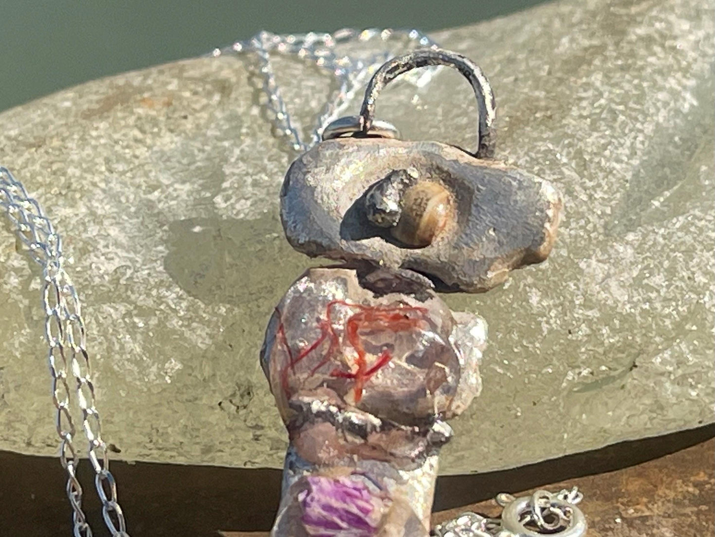 Recycled silver artisan necklace. On sale as it is a practice piece. Integrating seaweed and a violet petal. Unique silver artisan necklace.