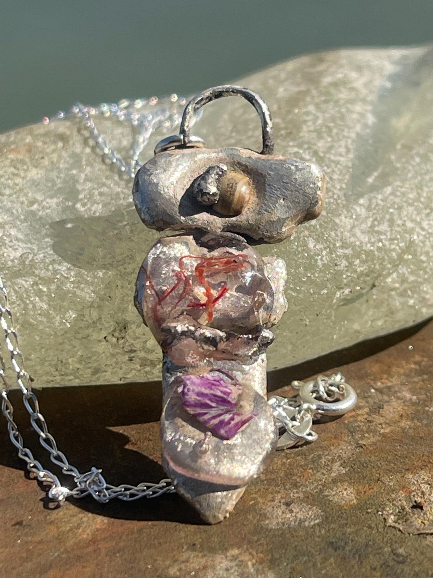 Recycled silver artisan necklace. On sale as it is a practice piece. Integrating seaweed and a violet petal. Unique silver artisan necklace.