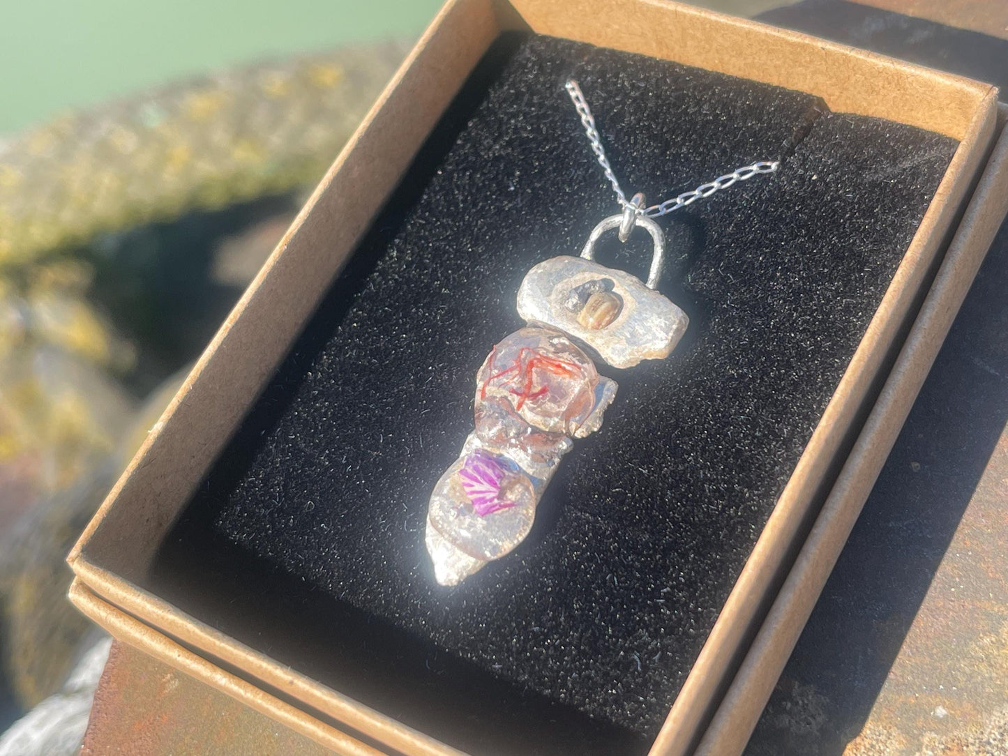 Recycled silver artisan necklace. On sale as it is a practice piece. Integrating seaweed and a violet petal. Unique silver artisan necklace.