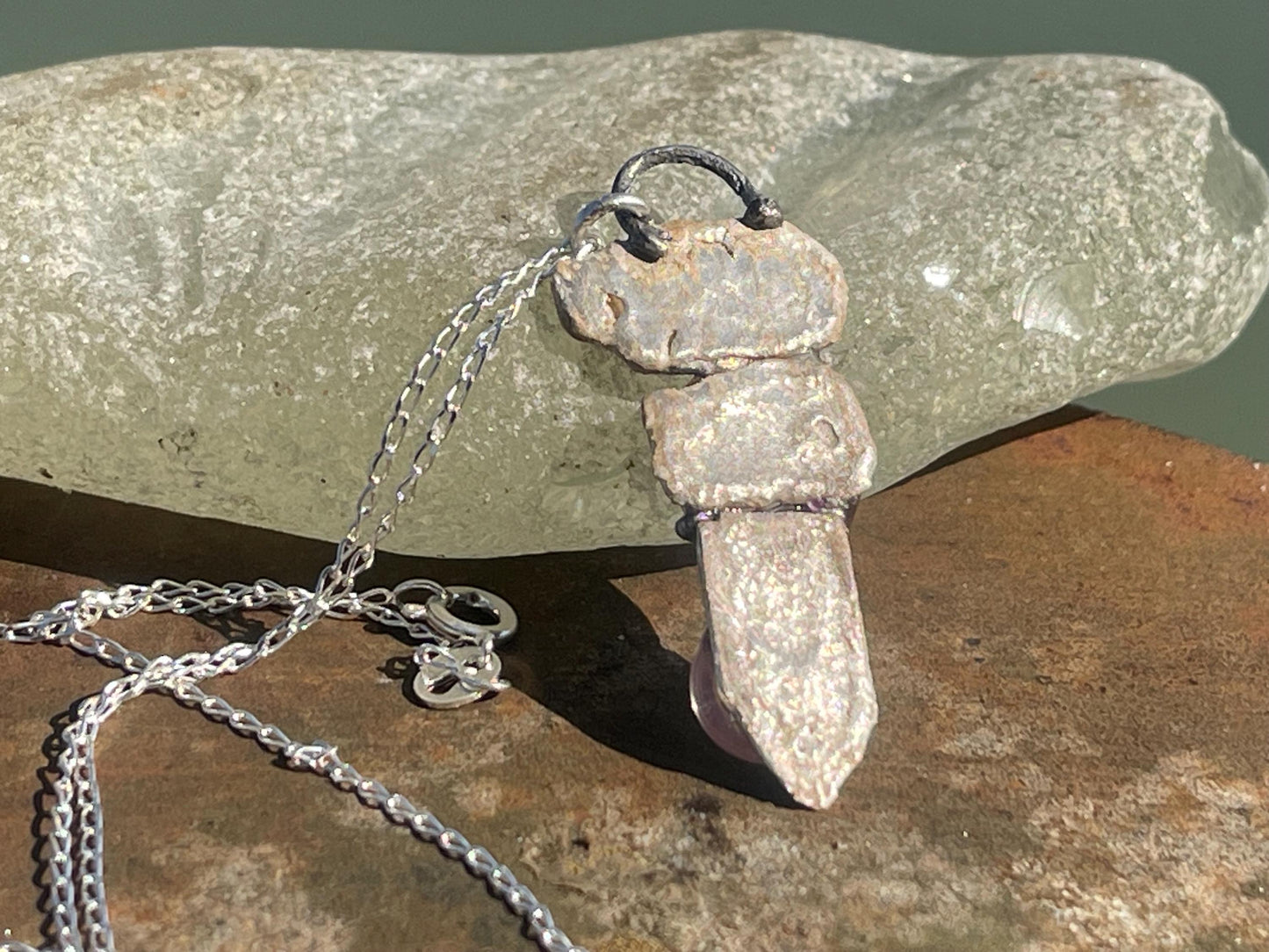 Recycled silver artisan necklace. On sale as it is a practice piece. Integrating seaweed and a violet petal. Unique silver artisan necklace.