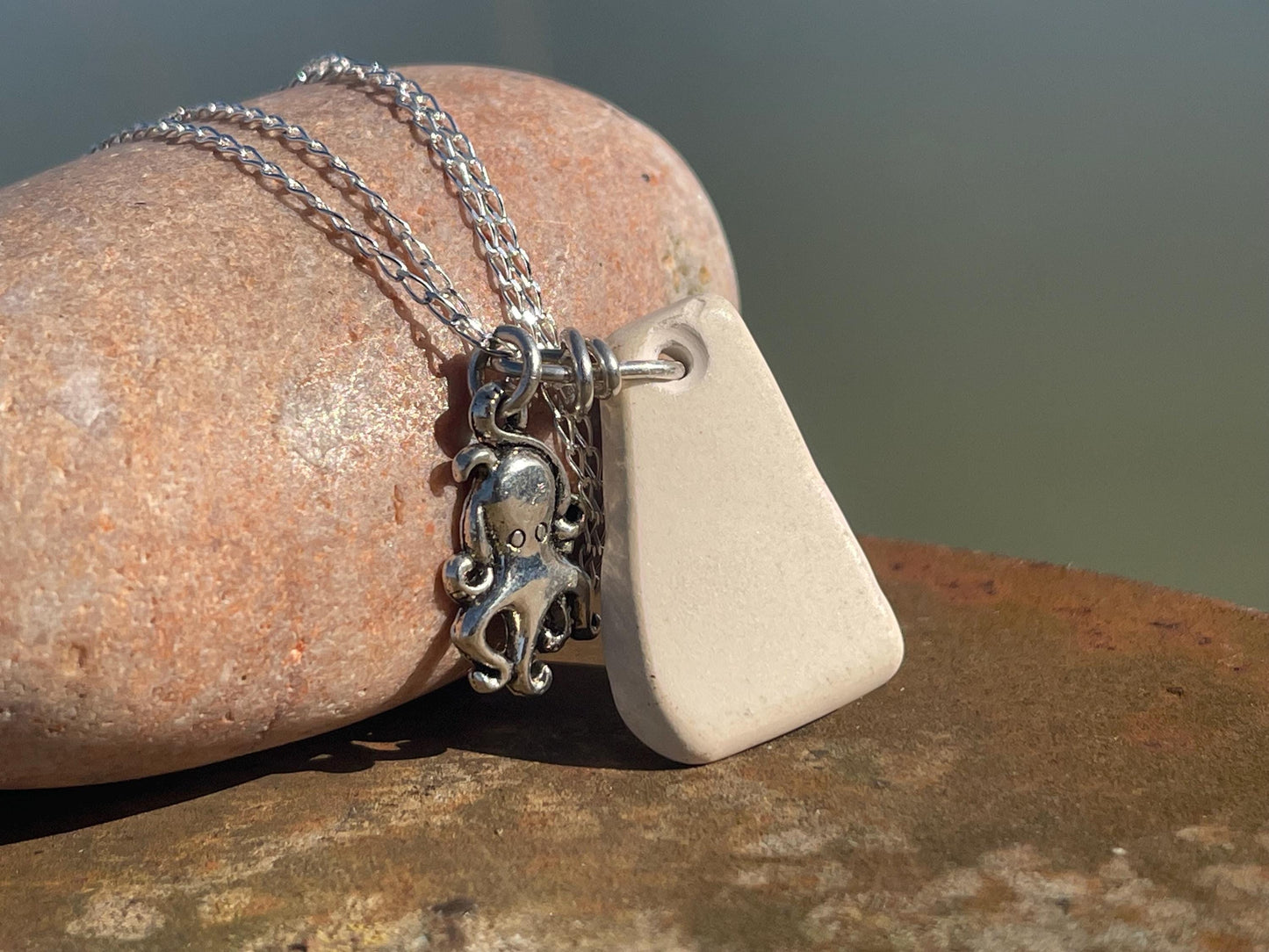 Eco friendly sea ceramic necklace on a sterling silver chain. Eco friendly jewellery, ethical jewellery. Eco friendly necklace.