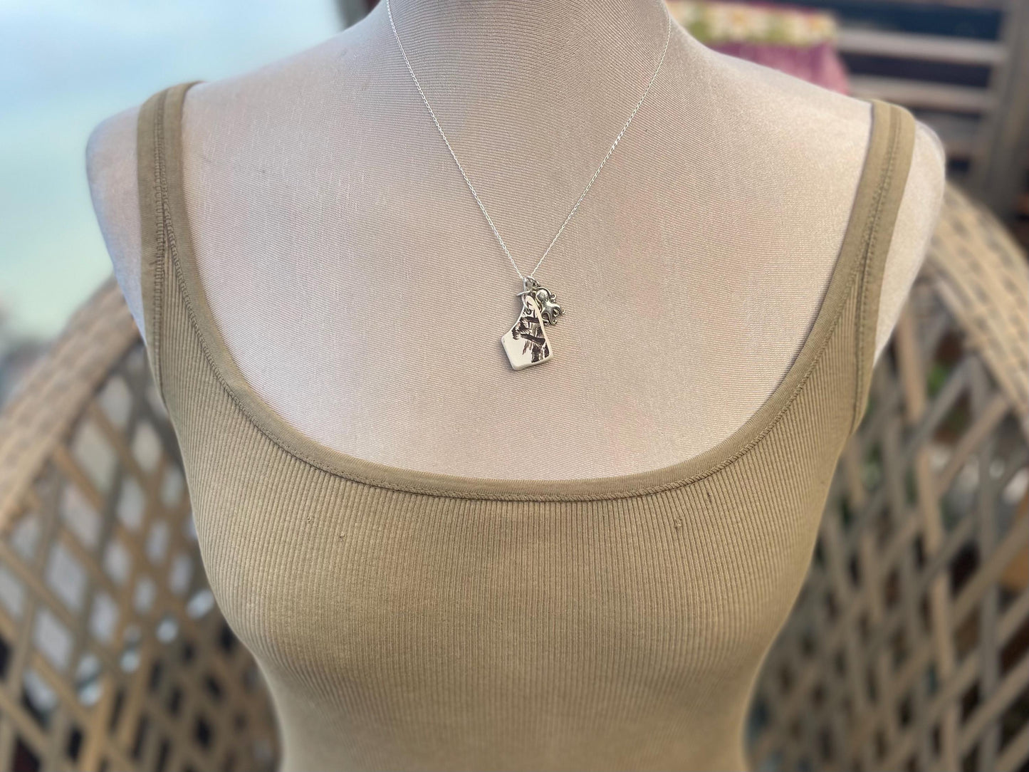 Eco friendly sea ceramic necklace on a sterling silver chain. Eco friendly jewellery, ethical jewellery. Eco friendly necklace.