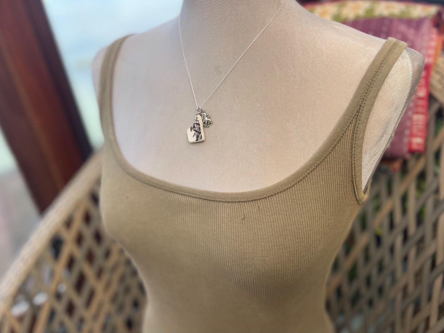 Eco friendly sea ceramic necklace on a sterling silver chain. Eco friendly jewellery, ethical jewellery. Eco friendly necklace.