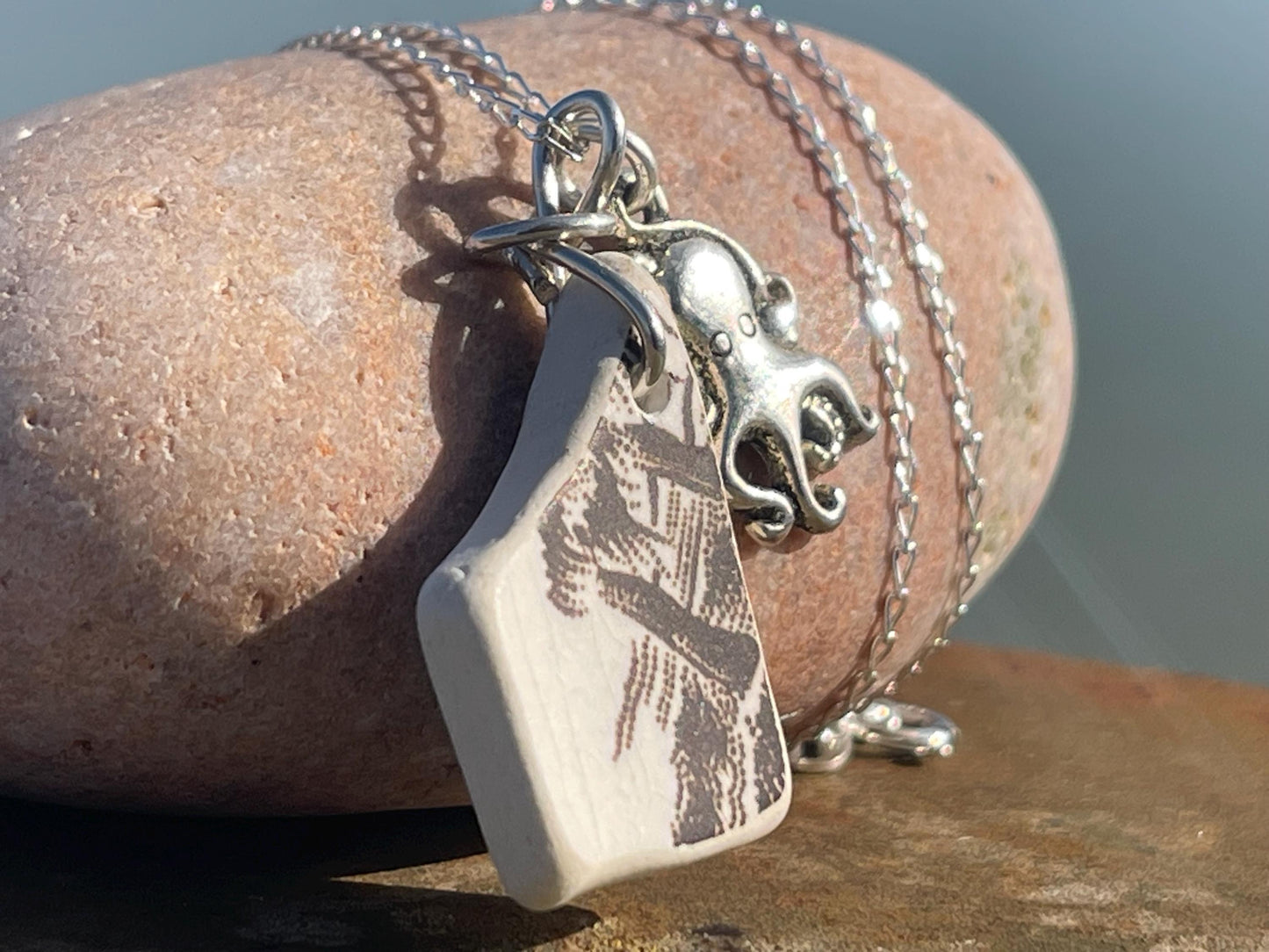 Eco friendly sea ceramic necklace on a sterling silver chain. Eco friendly jewellery, ethical jewellery. Eco friendly necklace.