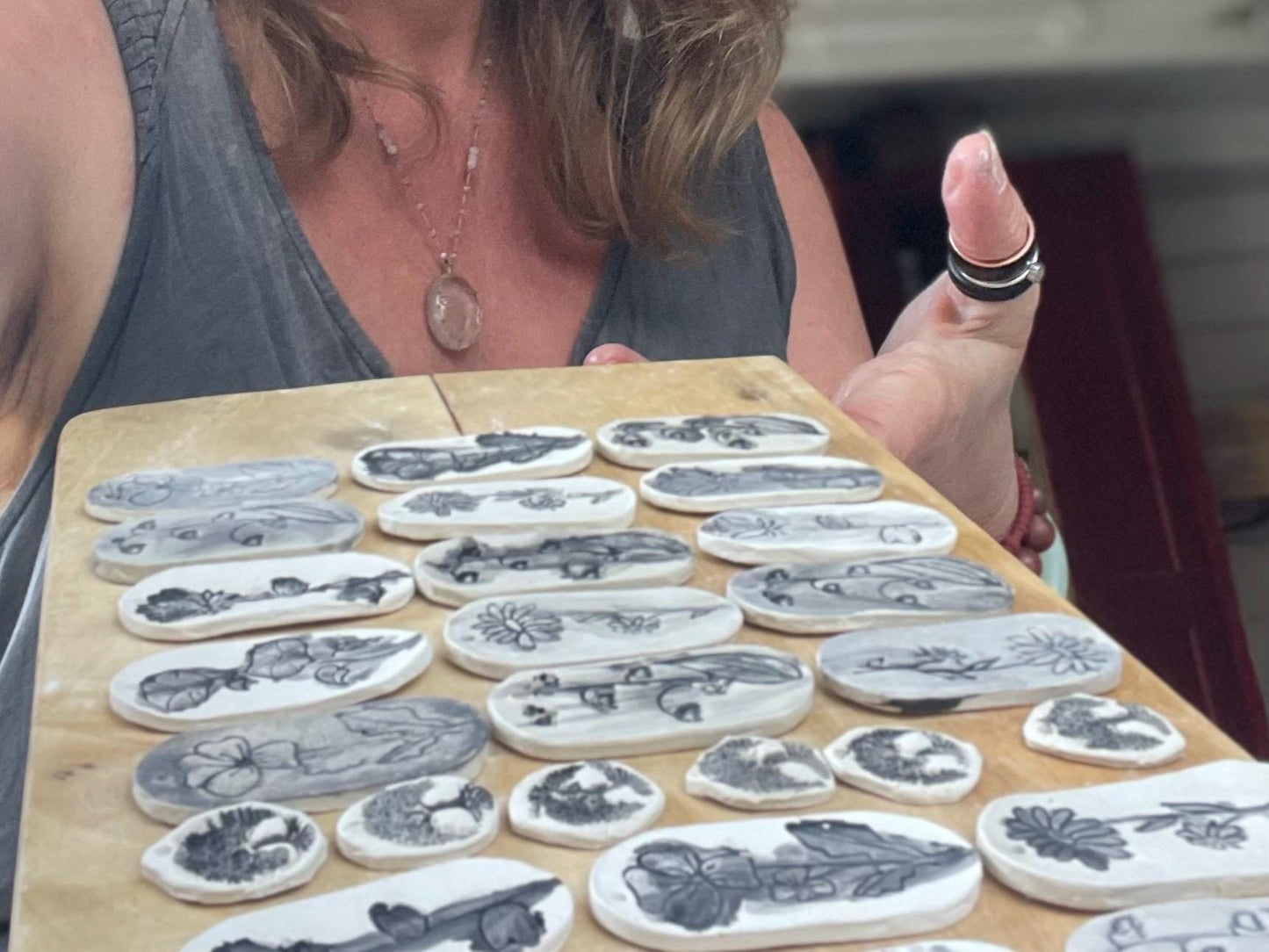 Handmade Poppy necklace. Eco friendly jewellery. Ethical pendants made with waste clay and burnt recycled copper. Ethical jewellery.