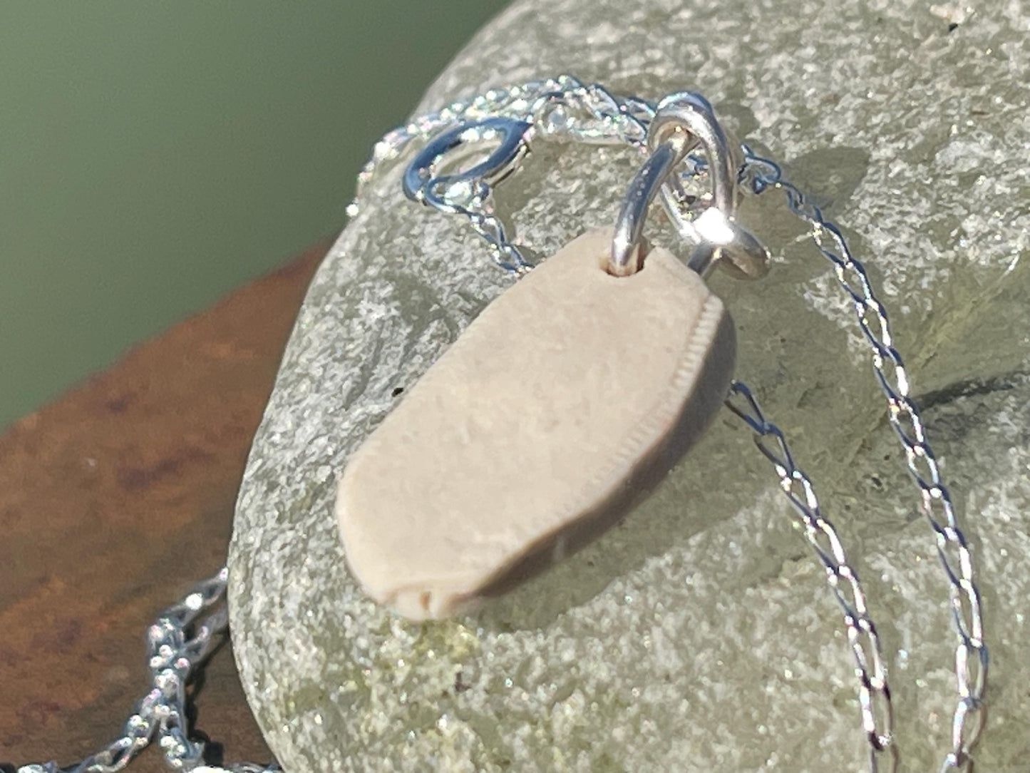 Handmade porcelain daisy pendant. Eco friendly jewellery. Handmade daisy necklaces on recycled sterling silver. Ethical jewellery. Eco gifts.