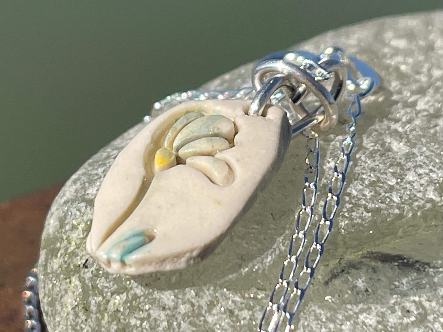 Handmade porcelain daisy pendant. Eco friendly jewellery. Handmade daisy necklaces on recycled sterling silver. Ethical jewellery. Eco gifts.