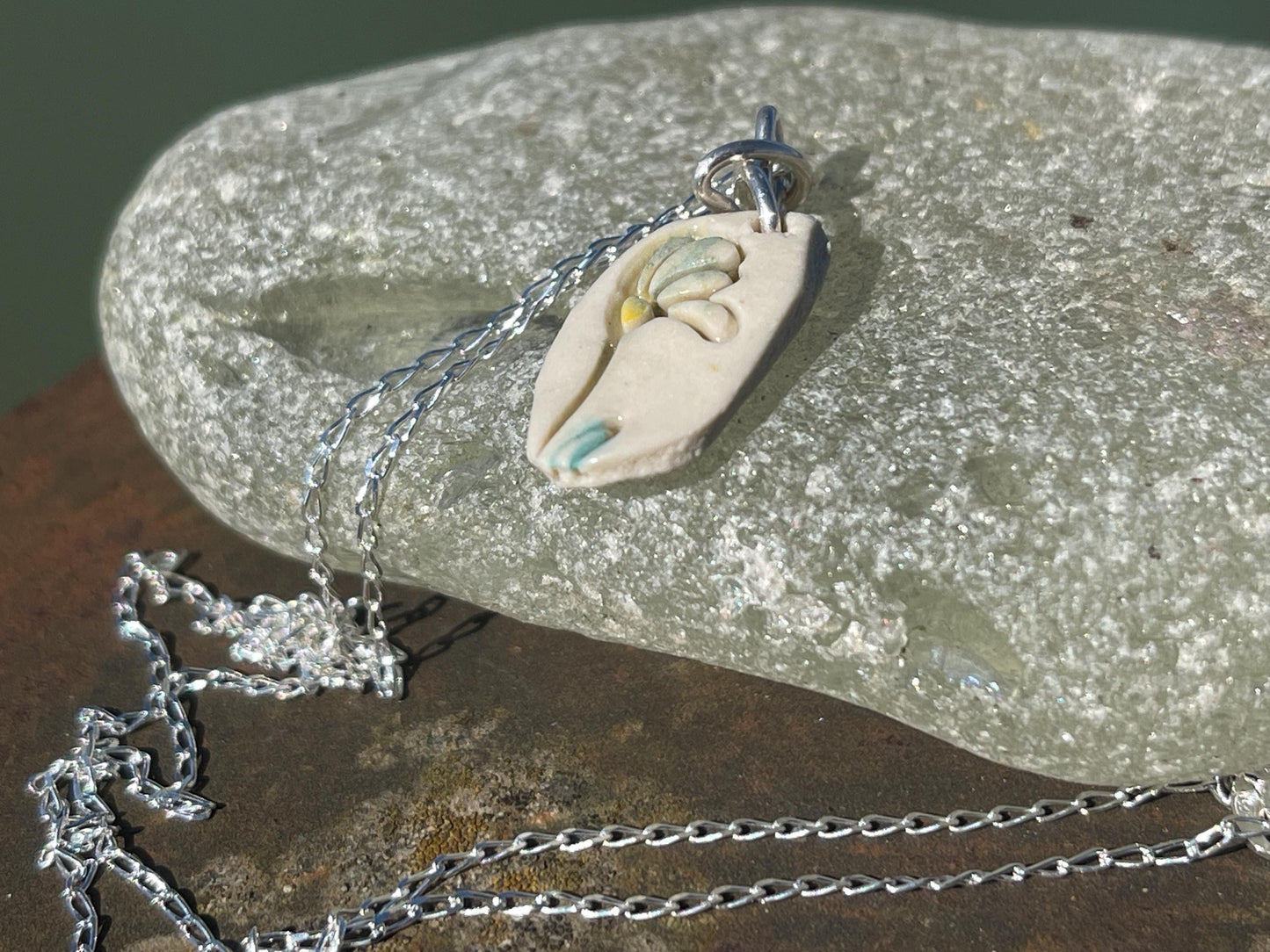 Handmade porcelain daisy pendant. Eco friendly jewellery. Handmade daisy necklaces on recycled sterling silver. Ethical jewellery. Eco gifts.