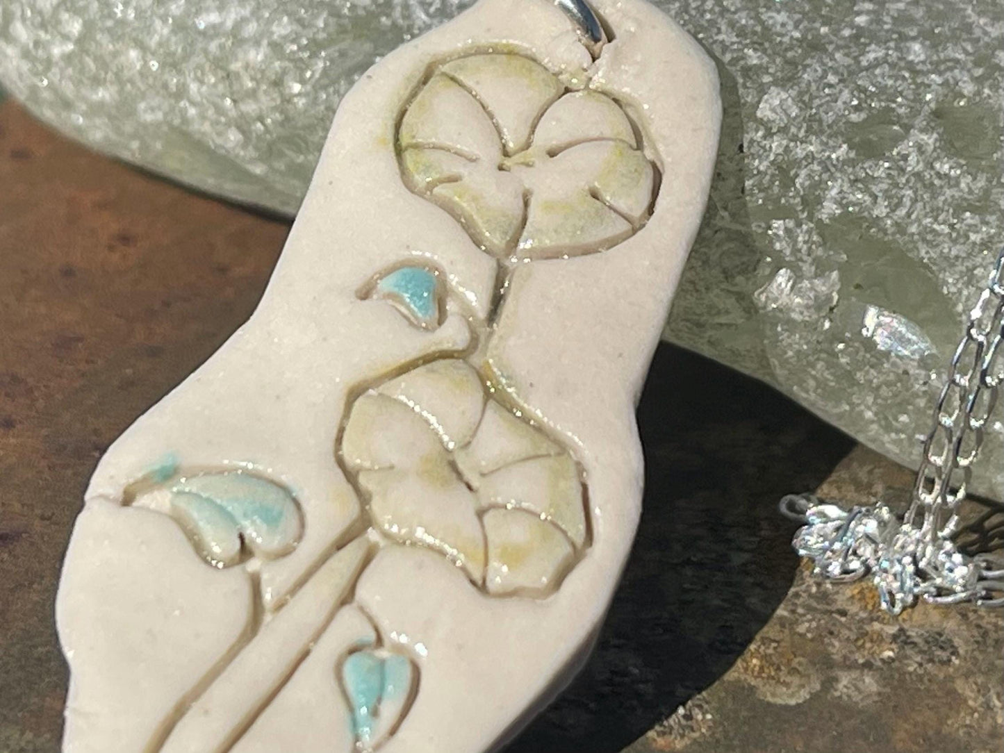 Handmade morning glory necklace. Eco friendly jewellery. Ethical pendants made with waste clay and recycled silver. Ethical jewellery.