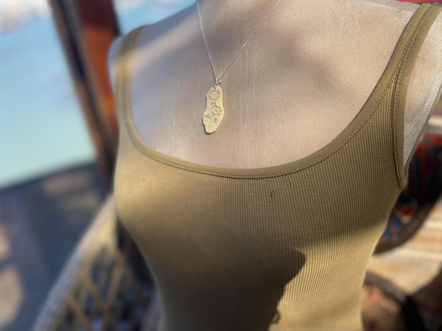 Handmade morning glory necklace. Eco friendly jewellery. Ethical pendants made with waste clay and recycled silver. Ethical jewellery.