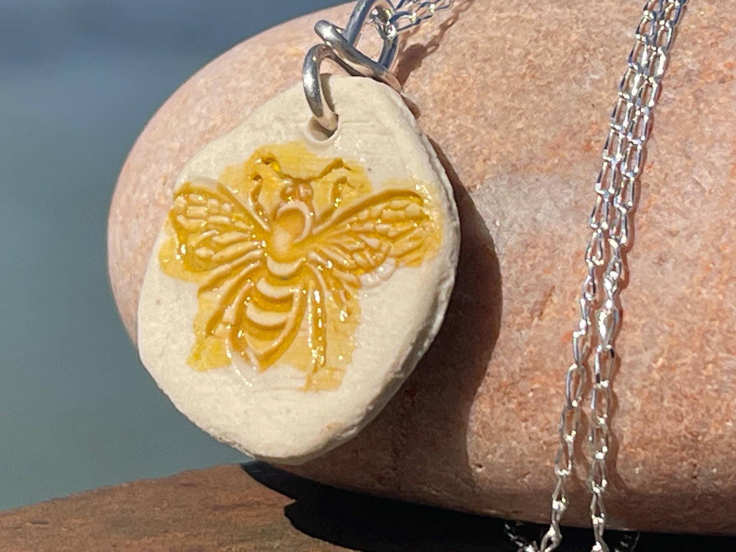 Handmade bee necklace. Eco friendly jewellery. Ethical pendants made with waste clay and recycled sterling silver. Ethical jewellery.
