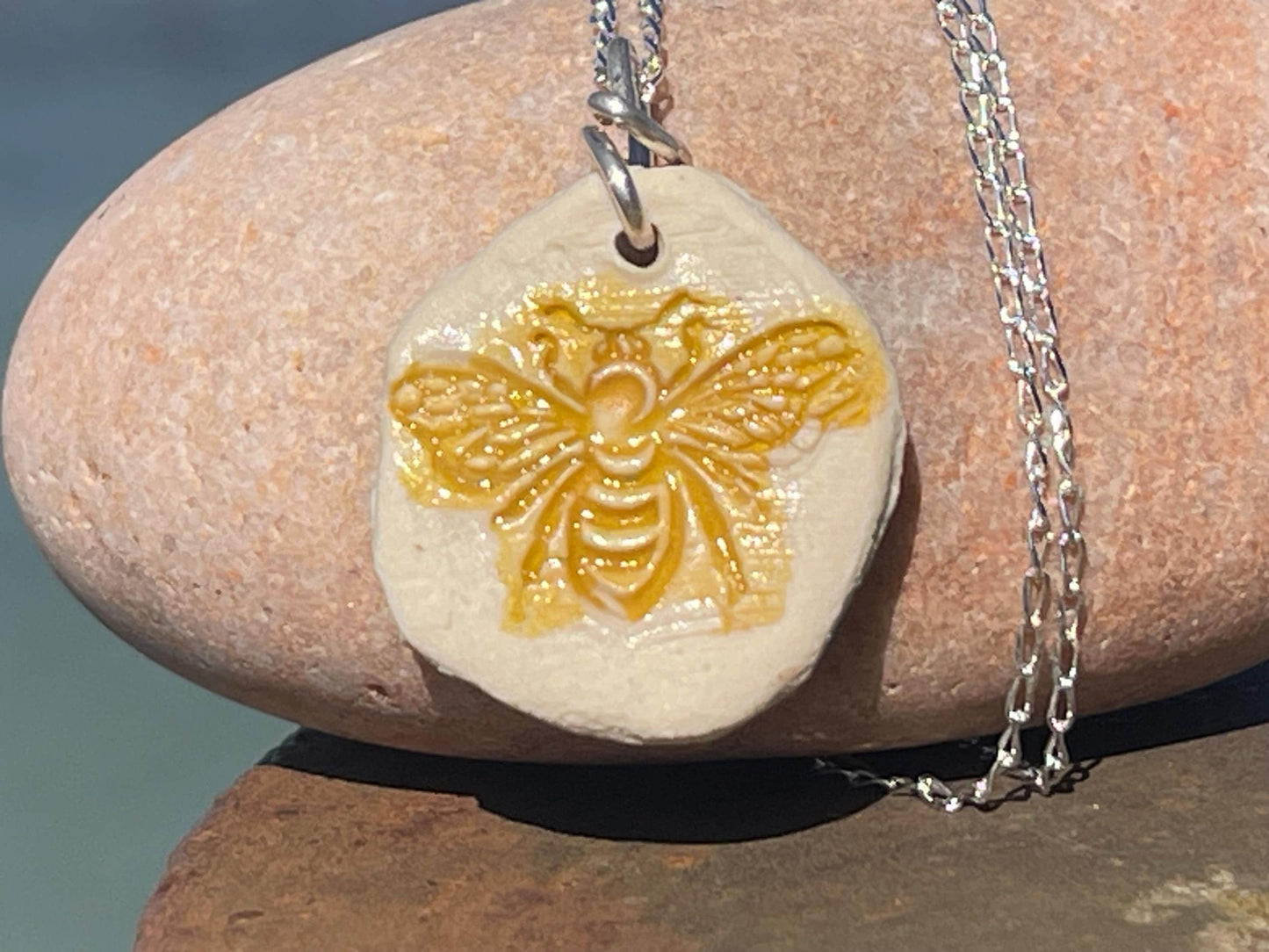Handmade bee necklace. Eco friendly jewellery. Ethical pendants made with waste clay and recycled sterling silver. Ethical jewellery.