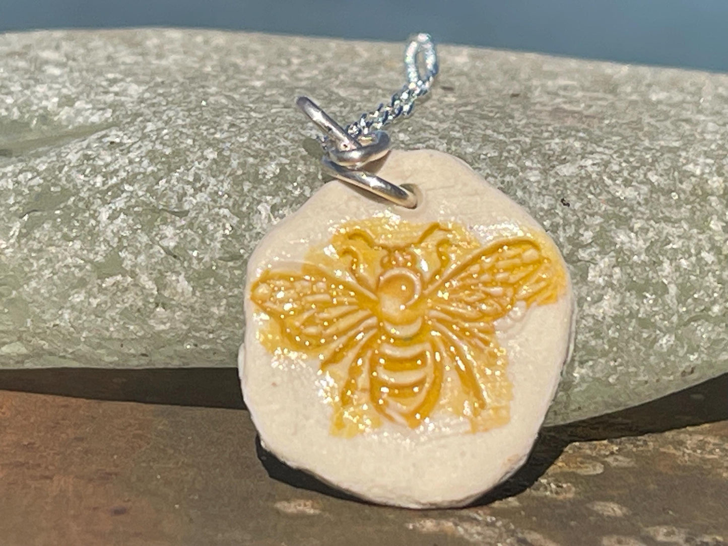 Handmade bee necklace. Eco friendly jewellery. Ethical pendants made with waste clay and recycled sterling silver. Ethical jewellery.