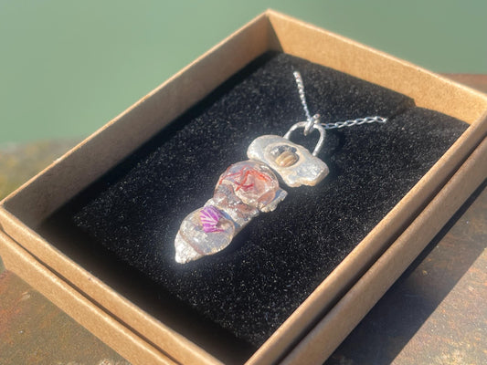 Recycled silver artisan necklace. On sale as it is a practice piece. Integrating seaweed and a violet petal. Unique silver artisan necklace.