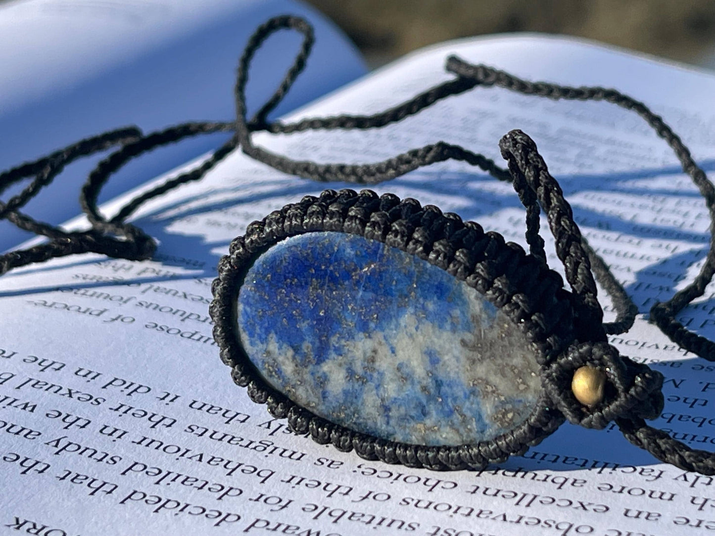 Stunning macrame lapis necklace on an adjustable cord. Handmade gemstone necklace, boho jewellery. Macrame jewellery. Unique necklace.