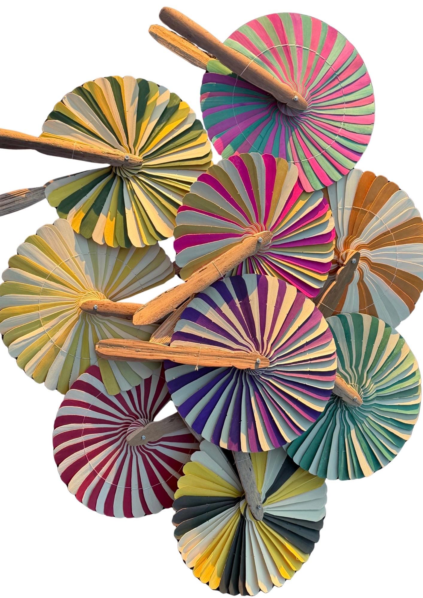 Absolutely beautiful eco friendly handheld bamboo fans. A wide range of colours. Large handmade fans. Eco gifts. Red, orange, green, purple.