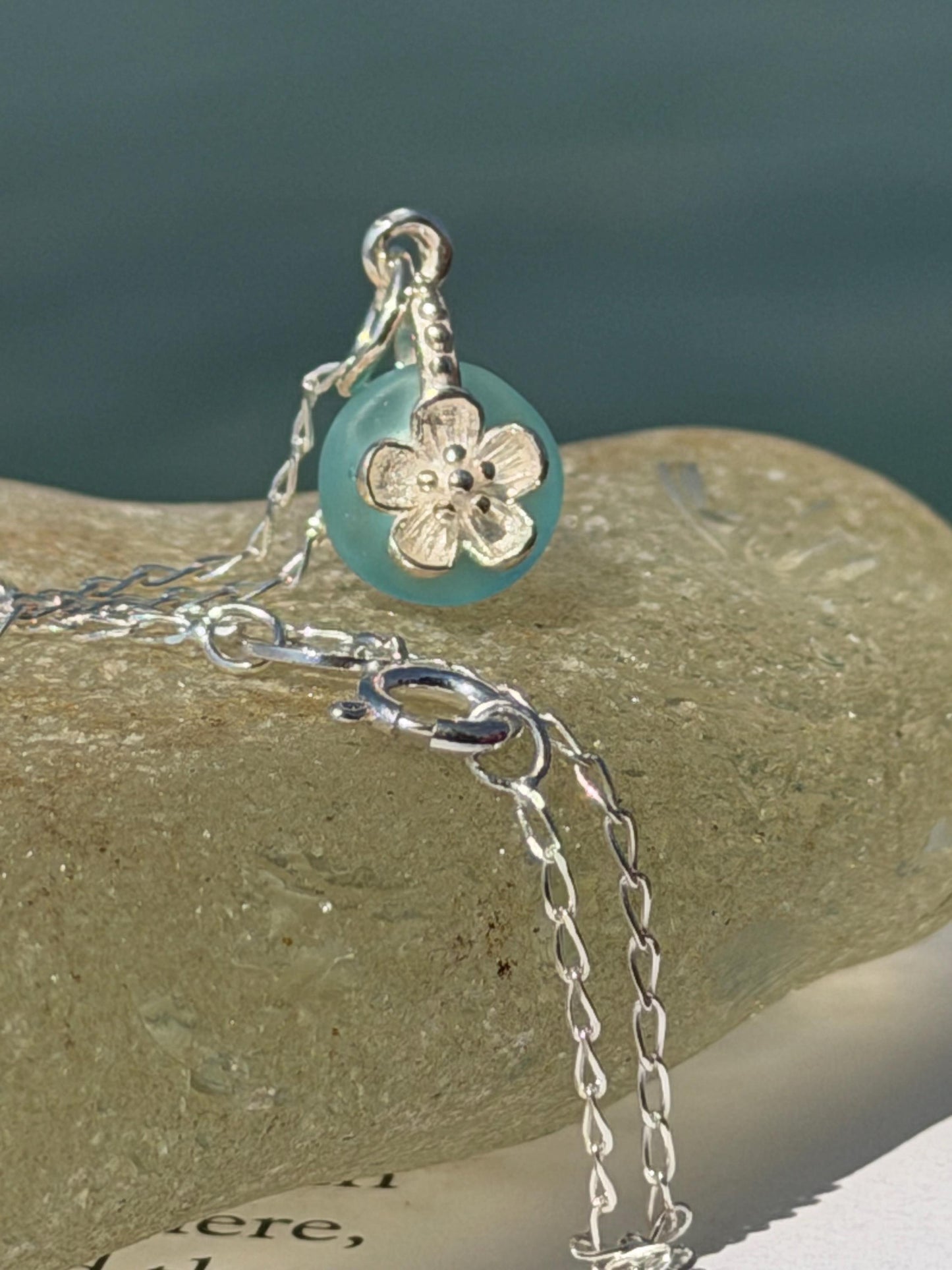 Dainty little sea glass necklace within sterling silver flowers. Recycled necklace. Ethical jewellery. Sea glass pendant. Eco friendly gifts
