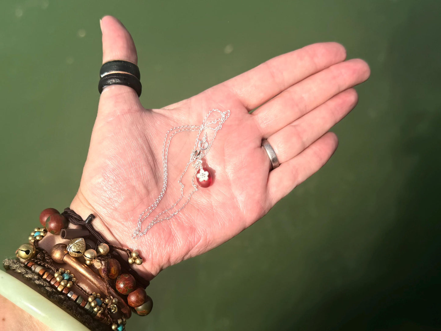 Dainty little sea glass necklace within sterling silver flowers. Recycled necklace. Ethical jewellery. Sea glass pendant. Eco friendly gifts