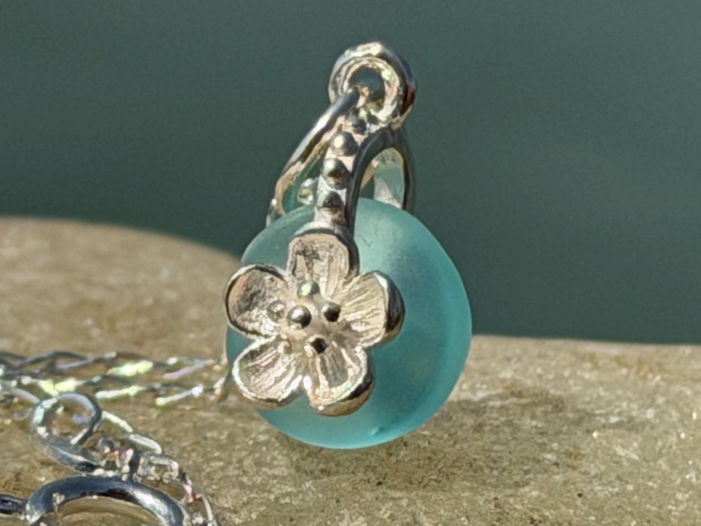 Dainty little sea glass necklace within sterling silver flowers. Recycled necklace. Ethical jewellery. Sea glass pendant. Eco friendly gifts