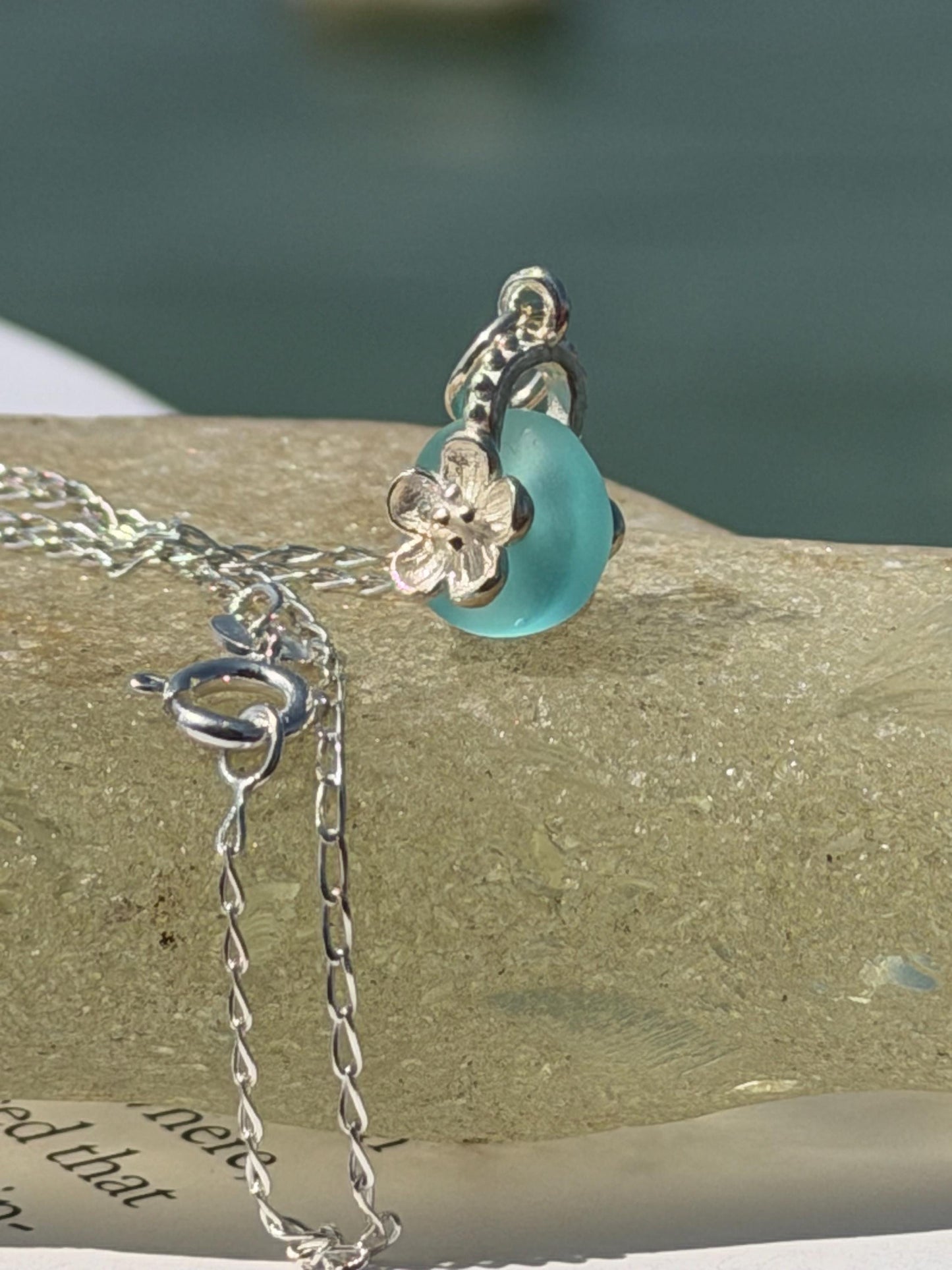 Dainty little sea glass necklace within sterling silver flowers. Recycled necklace. Ethical jewellery. Sea glass pendant. Eco friendly gifts