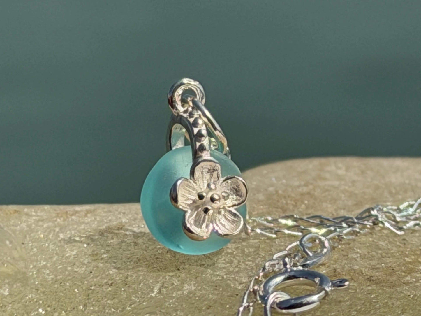 Dainty little sea glass necklace within sterling silver flowers. Recycled necklace. Ethical jewellery. Sea glass pendant. Eco friendly gifts