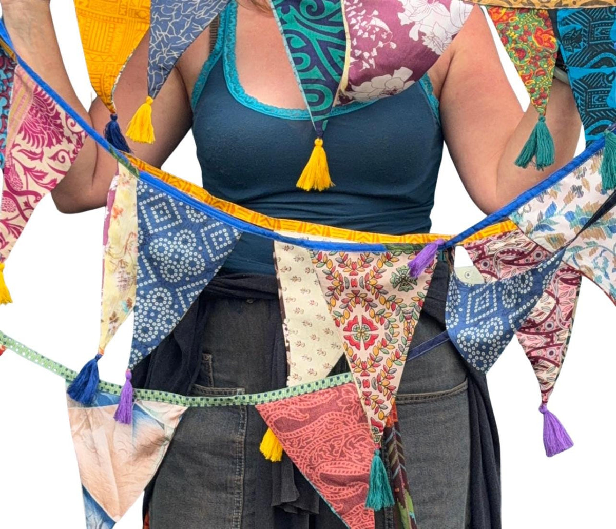Recycled bunting with long ties and tassels. Boho bunting for home, garden and parties. Party flags with tassels.  Colourful  & eco friendly