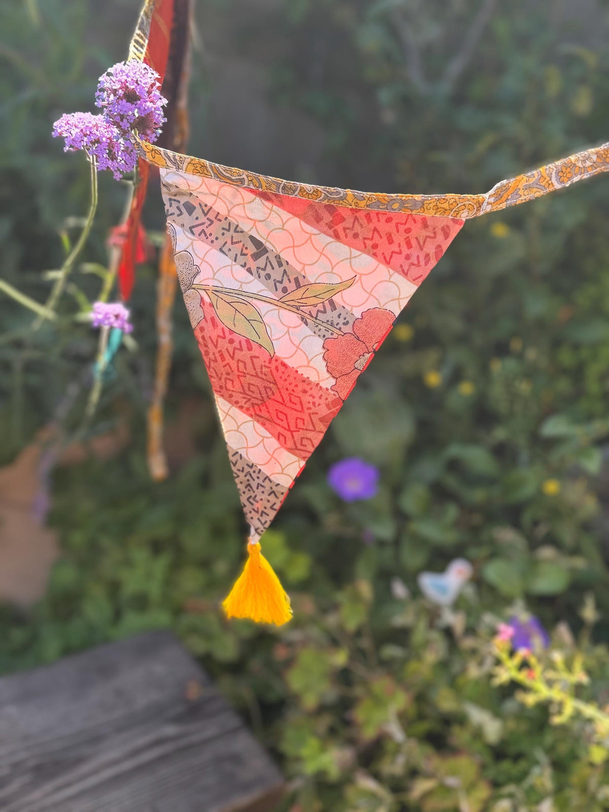 Recycled bunting with long ties and tassels. Boho bunting for home, garden and parties. Party flags with tassels.  Colourful  & eco friendly