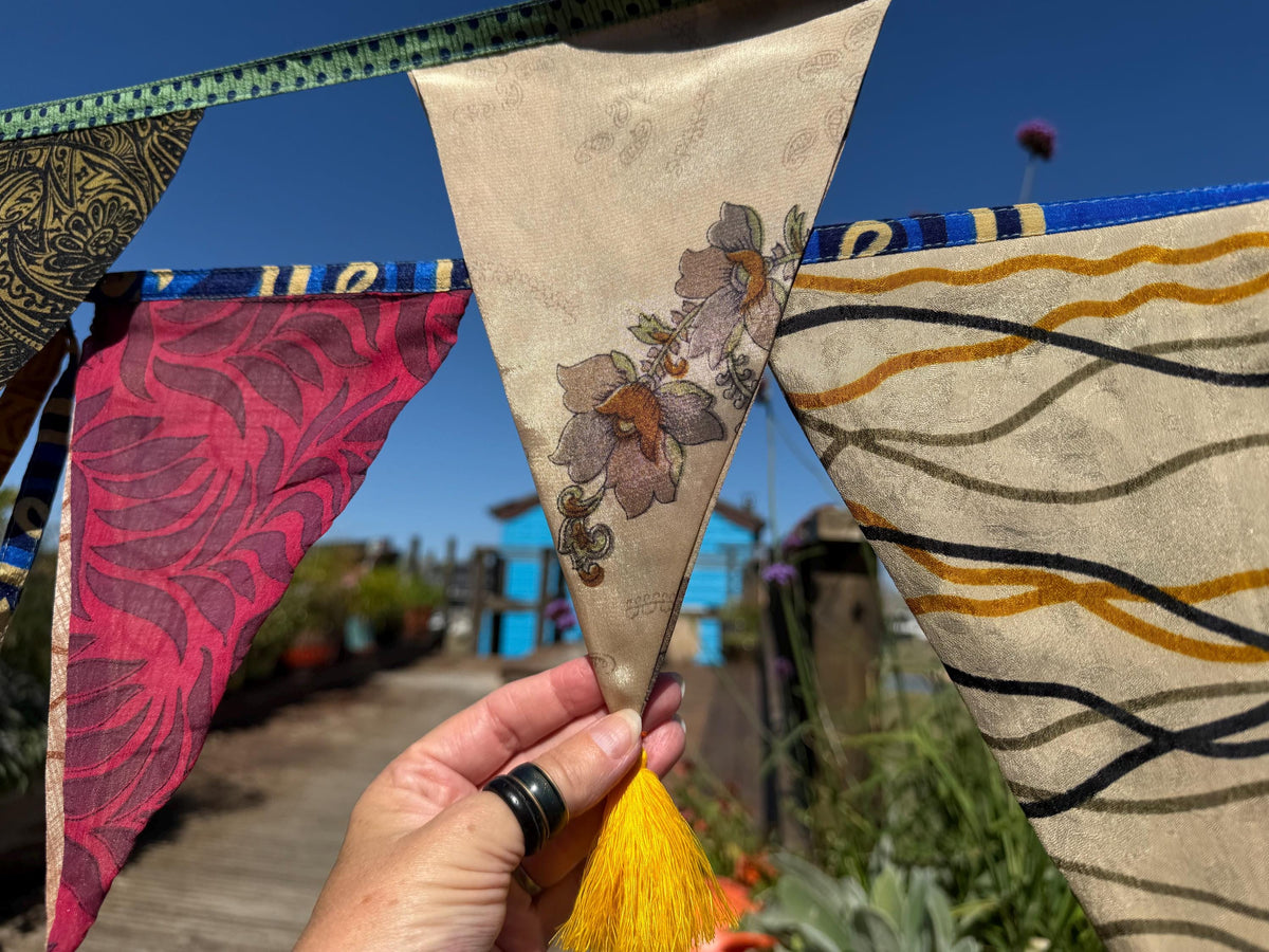 Recycled bunting with long ties and tassels. Boho bunting for home, garden and parties. Party flags with tassels.  Colourful  & eco friendly