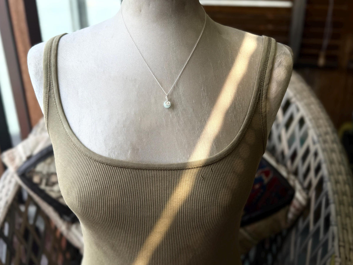 Dainty little recycled glass necklace within sterling silver flower. Recycled necklace. Ethical jewellery. glass pendant. Eco friendly gifts