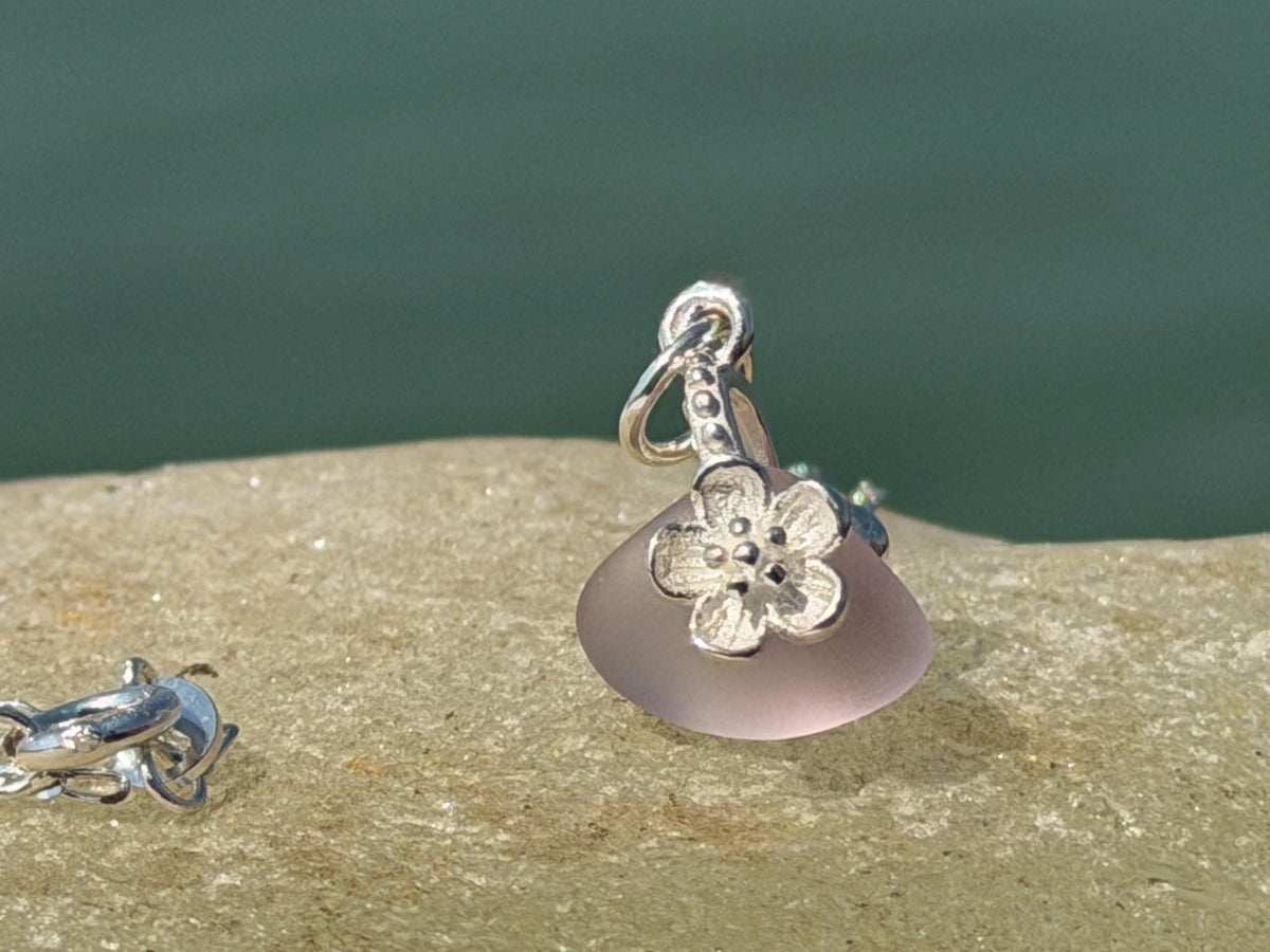 Dainty little recycled glass necklace within sterling silver flower. Recycled necklace. Ethical jewellery. glass pendant. Eco friendly gifts