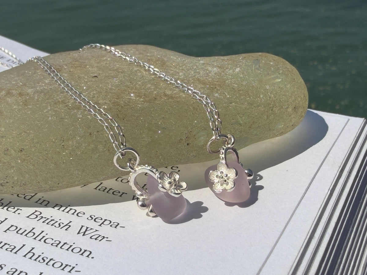 Dainty little recycled glass necklace within sterling silver flower. Recycled necklace. Ethical jewellery. glass pendant. Eco friendly gifts