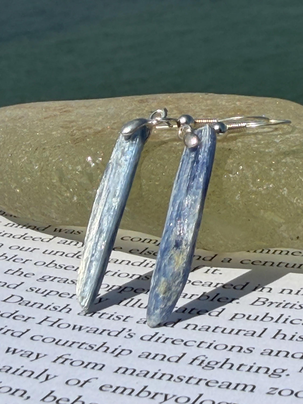 Blue kyanite earrings hung on recycled sterling silver. Angel wing earrings. Unique jewellery. handmade unusual jewellery, ethically made.