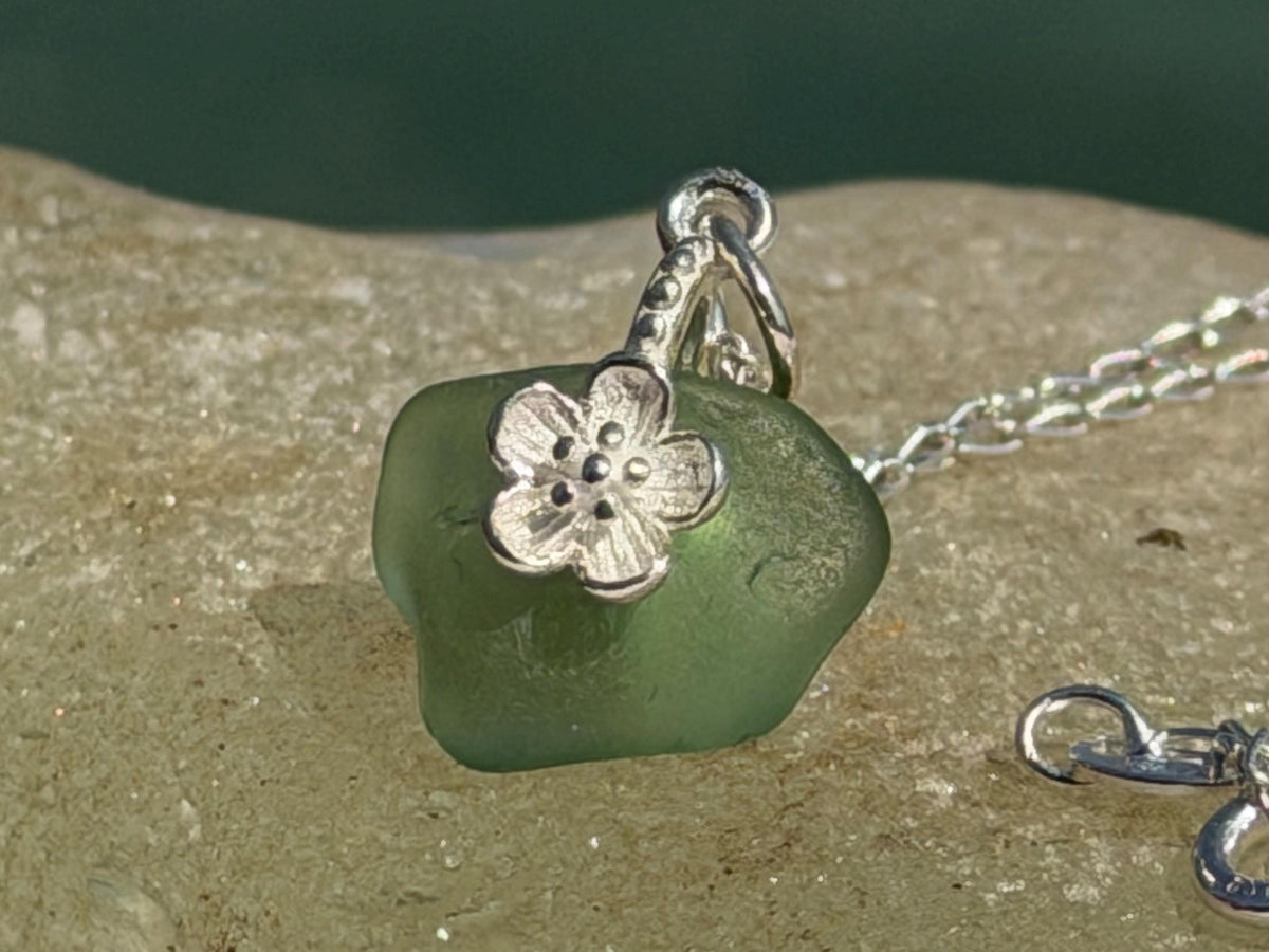 Dainty little sea glass necklace within sterling silver flowers. Recycled necklace. Ethical jewellery. Sea glass pendant. Eco friendly gifts