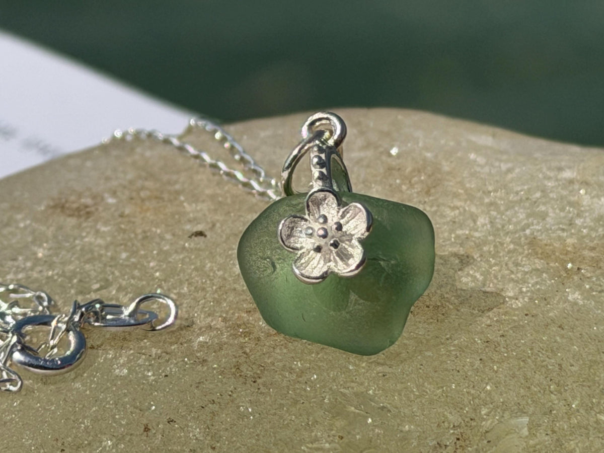Dainty little sea glass necklace within sterling silver flowers. Recycled necklace. Ethical jewellery. Sea glass pendant. Eco friendly gifts