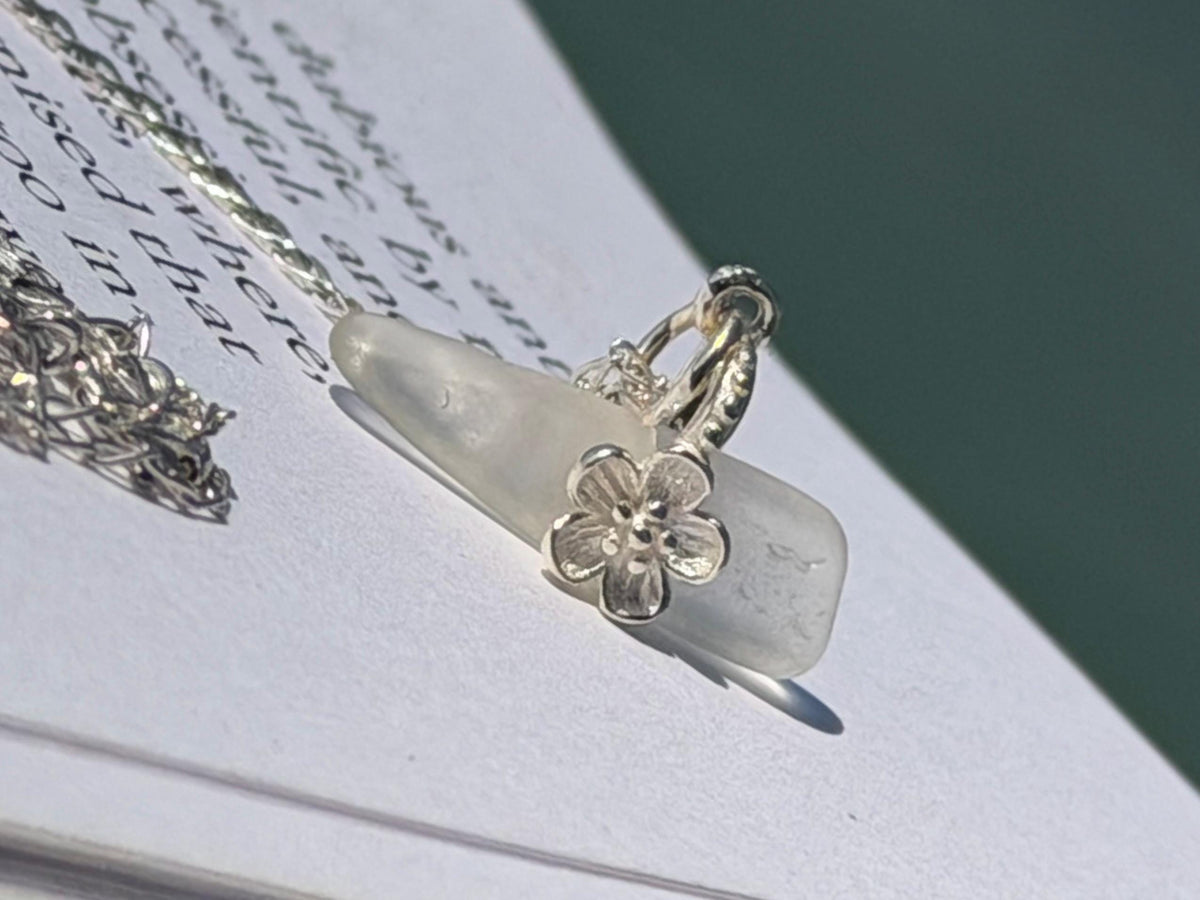 Dainty little sea glass necklace within sterling silver flowers. Recycled necklace. Ethical jewellery. Sea glass pendant. Eco friendly gifts