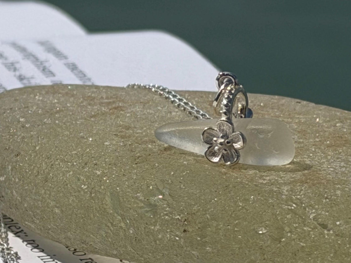 Dainty little sea glass necklace within sterling silver flowers. Recycled necklace. Ethical jewellery. Sea glass pendant. Eco friendly gifts
