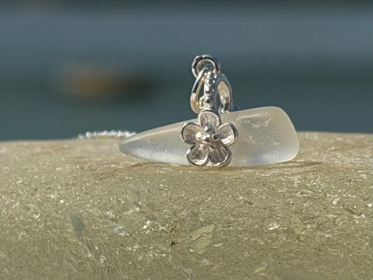 Dainty little sea glass necklace within sterling silver flowers. Recycled necklace. Ethical jewellery. Sea glass pendant. Eco friendly gifts