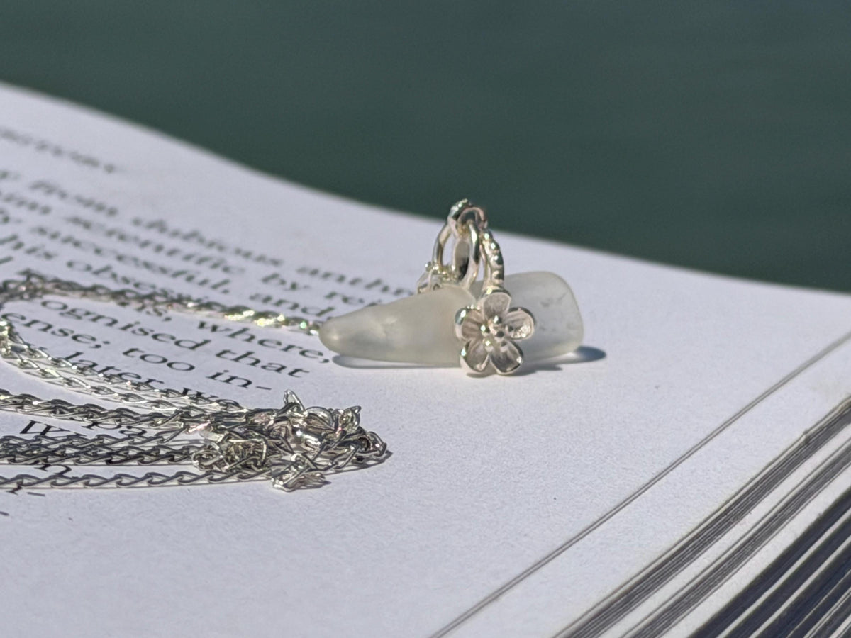 Dainty little sea glass necklace within sterling silver flowers. Recycled necklace. Ethical jewellery. Sea glass pendant. Eco friendly gifts