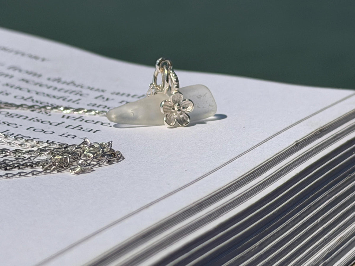 Dainty little sea glass necklace within sterling silver flowers. Recycled necklace. Ethical jewellery. Sea glass pendant. Eco friendly gifts