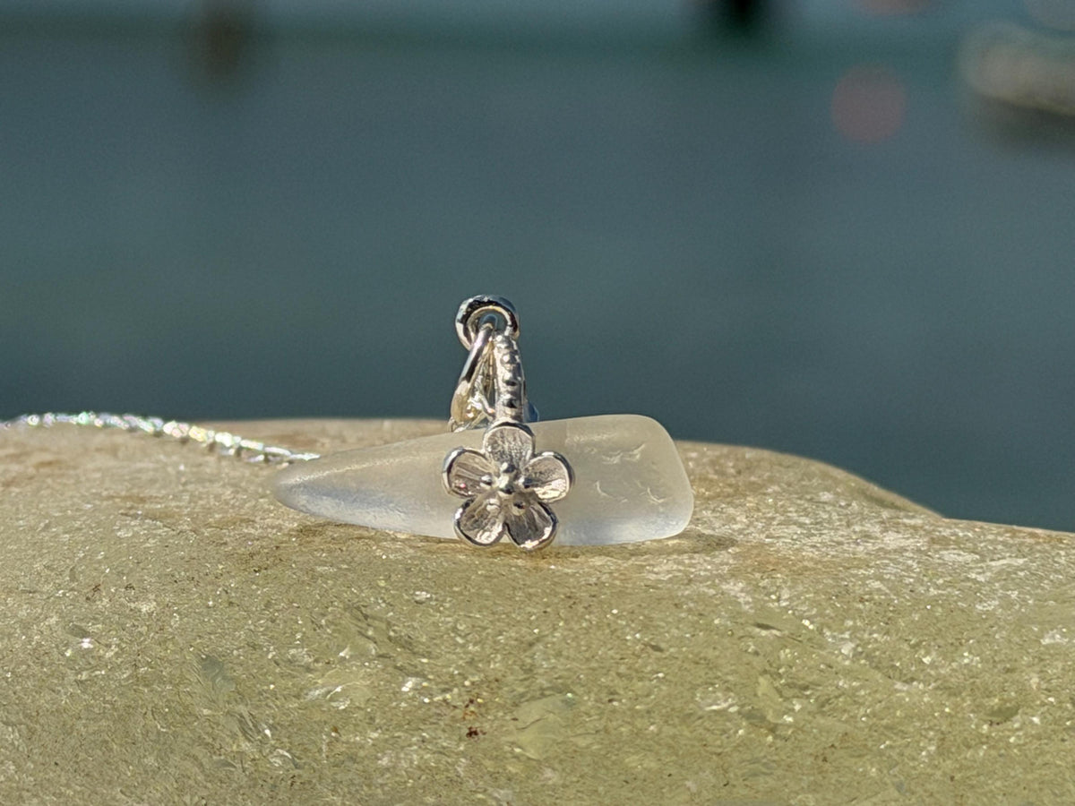 Dainty little sea glass necklace within sterling silver flowers. Recycled necklace. Ethical jewellery. Sea glass pendant. Eco friendly gifts
