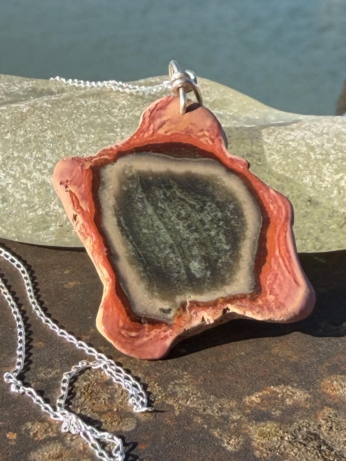Eco friendly handmade necklace made from Rhodochrosite & recycled silver. Ethical jewellery. Unique handmade jewellery. Orange necklaces.