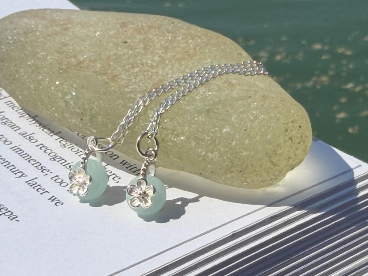 Dainty little recycled glass necklace within sterling silver flower. Recycled necklace. Ethical jewellery. glass pendant. Eco friendly gifts
